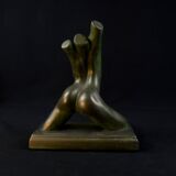 Modern sculpture of a nude woman in green ceramic, signed Carlos Nazareth