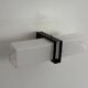 Simple white plexiglass wall light with a black metal frame, 1970s, Germany.