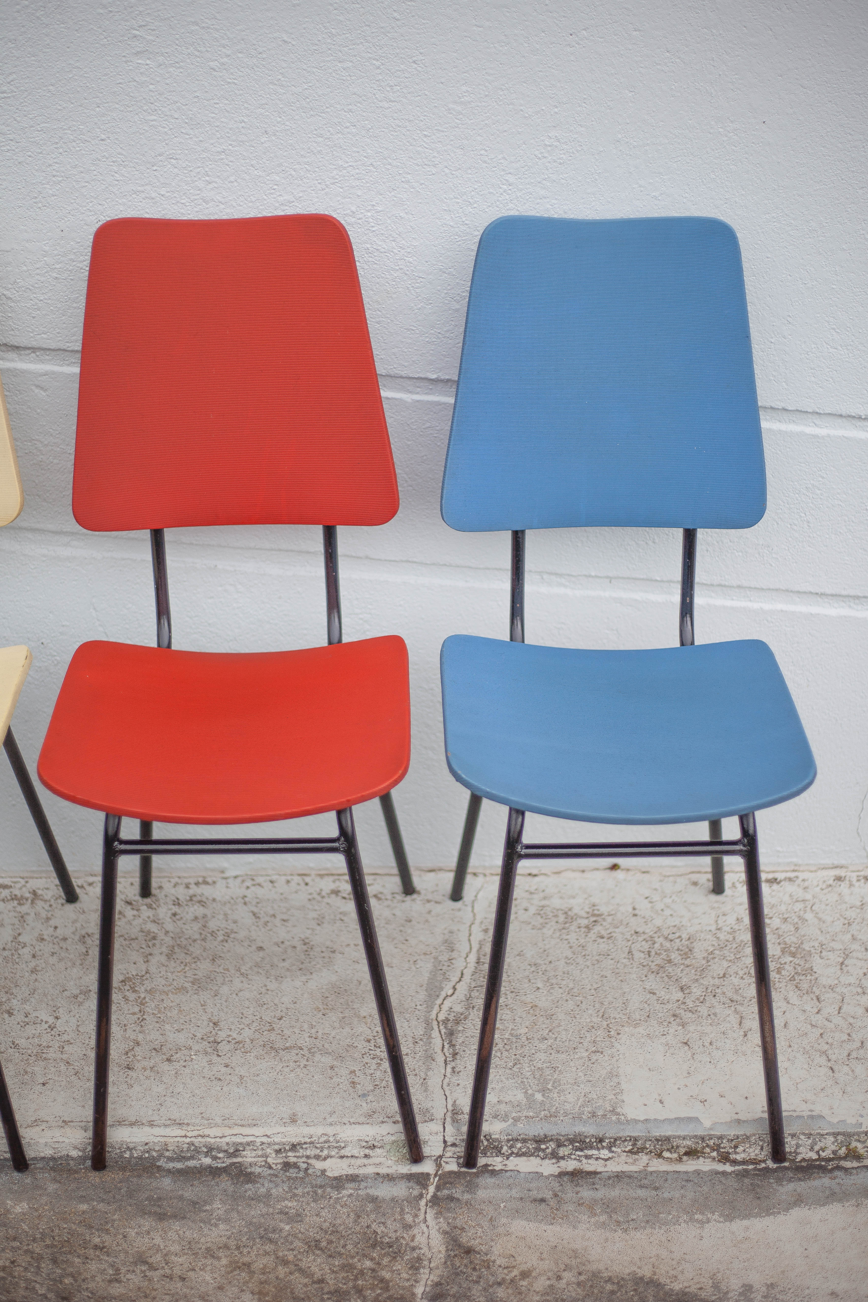 Set of 4 vintage chairs in metal and vinyl