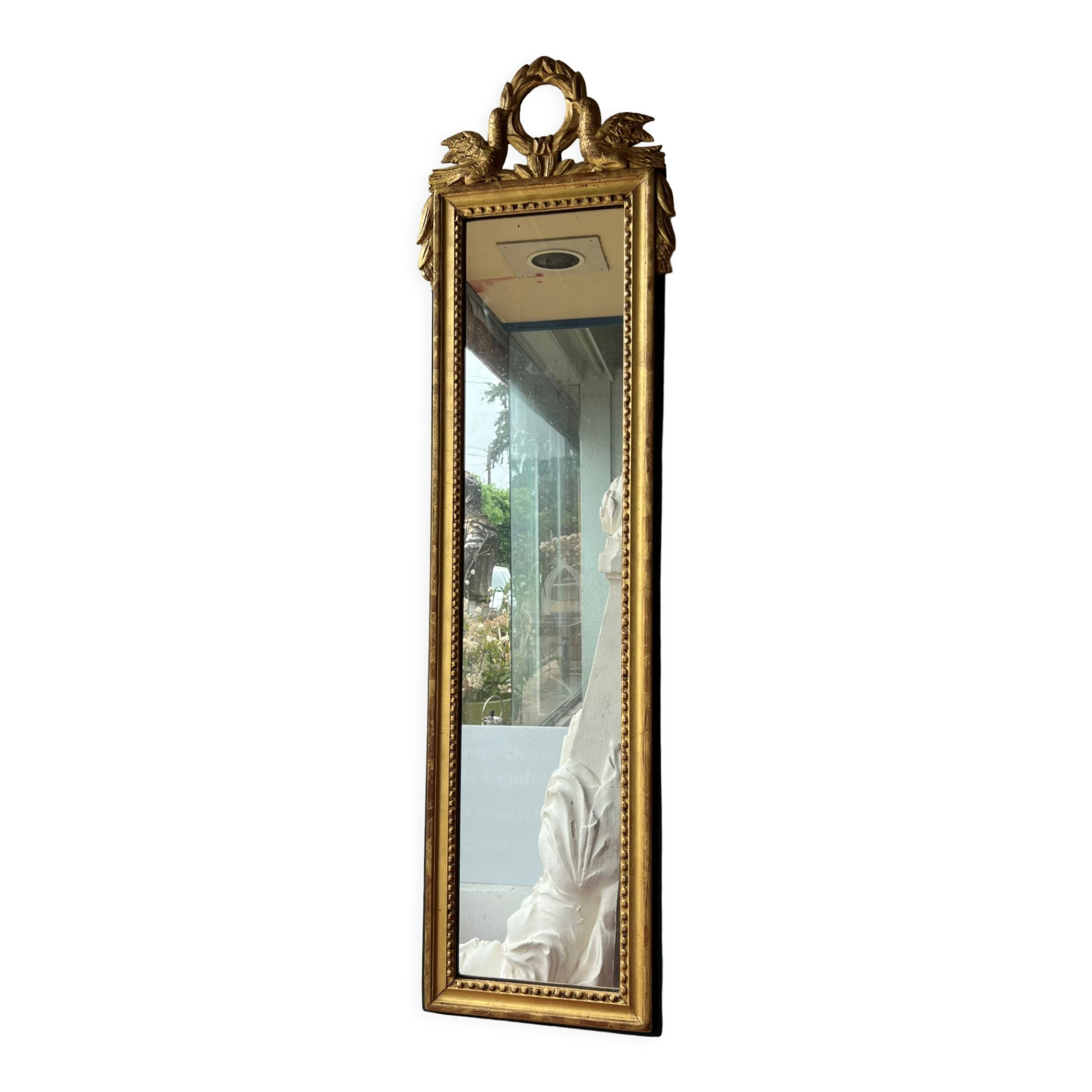 Mirror between two Louis XVI style in gilded wood with leaf around 1900
