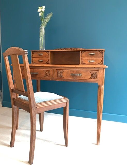 Secretary's office with an art deco chair
