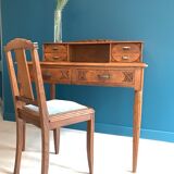 Secretary's office with an art deco chair