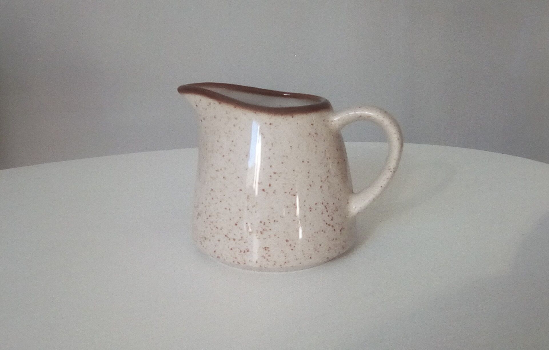 Speckled sandstone milk pitcher