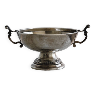 Silver metal bowl with decorative handles.