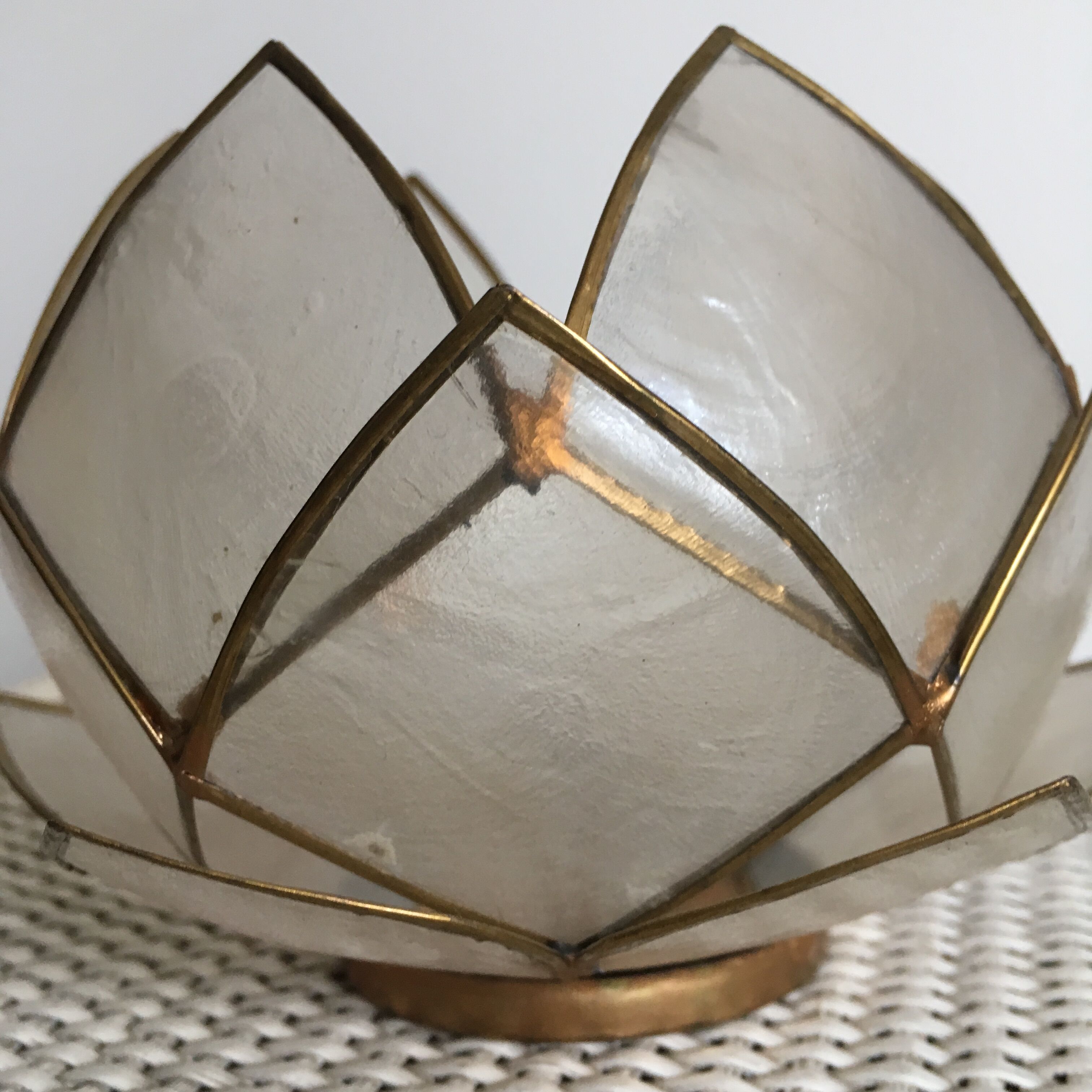 Candlestick or candle holder in nacre flower shape