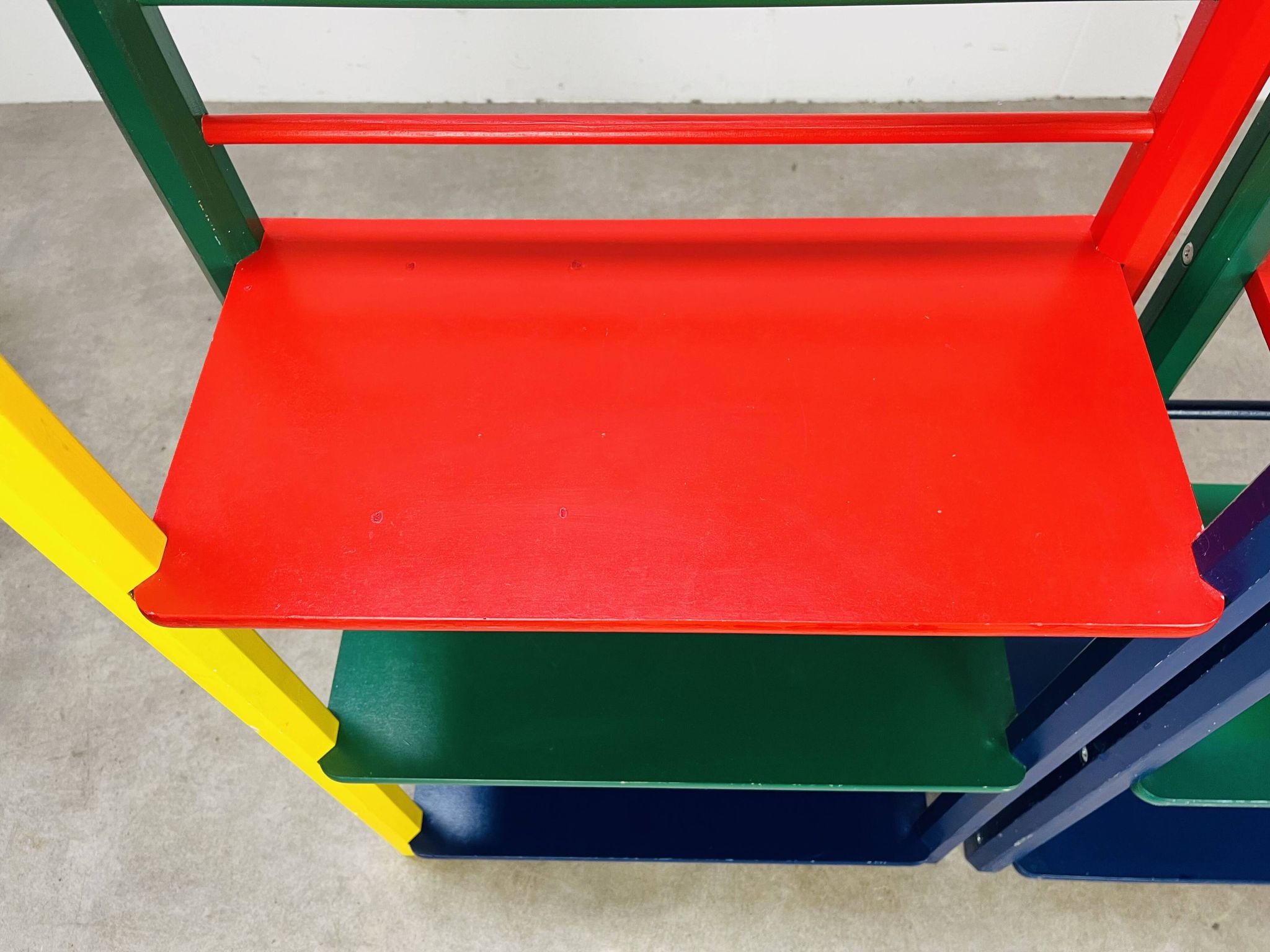 Pair of pencil-style shelves by Pierre Sala for children.