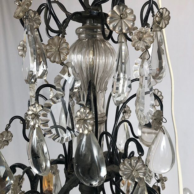 Black lacquered metal chandelier and crystal tassels