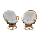 Pair of swivel rattan armchairs
