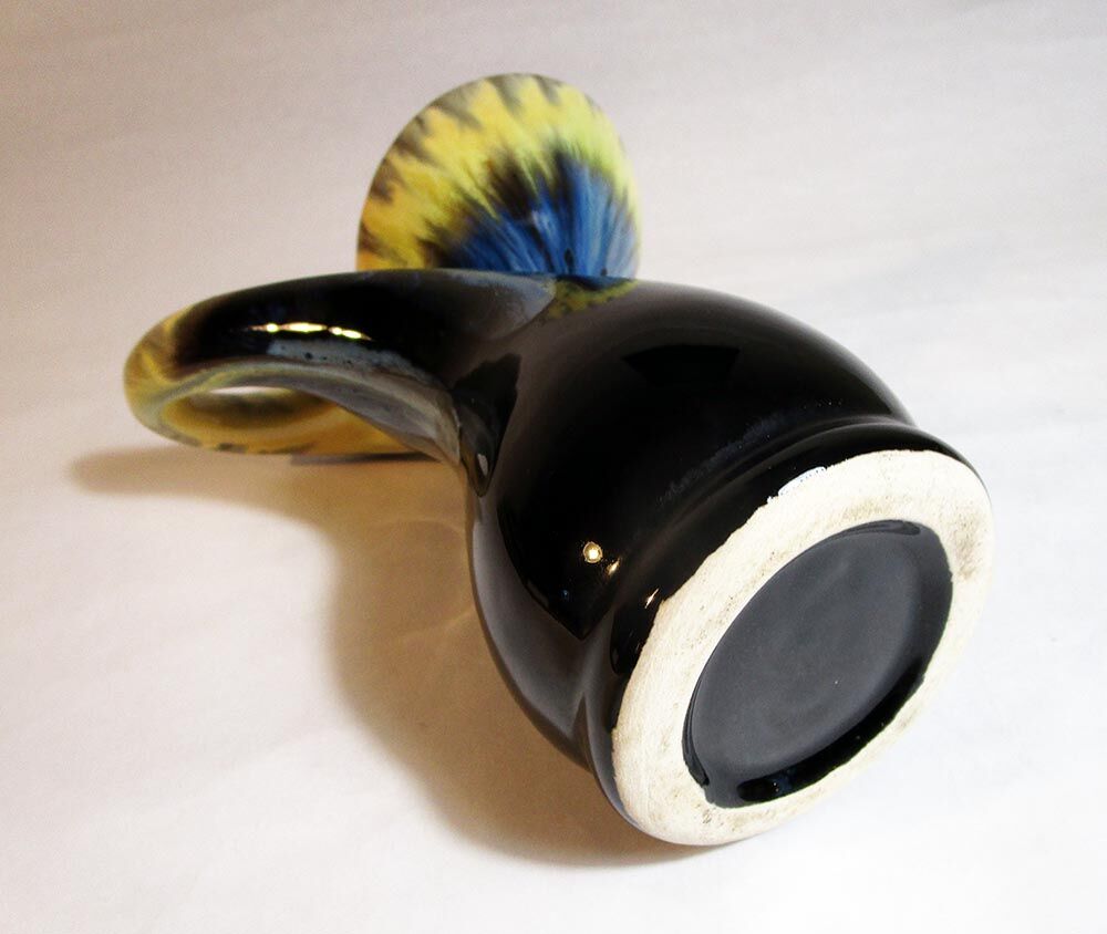 Vase with twisted handle