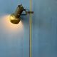 Lampadaire vintage en laiton avec spot orientable