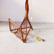 Lamppost wears vintage rattan magazine