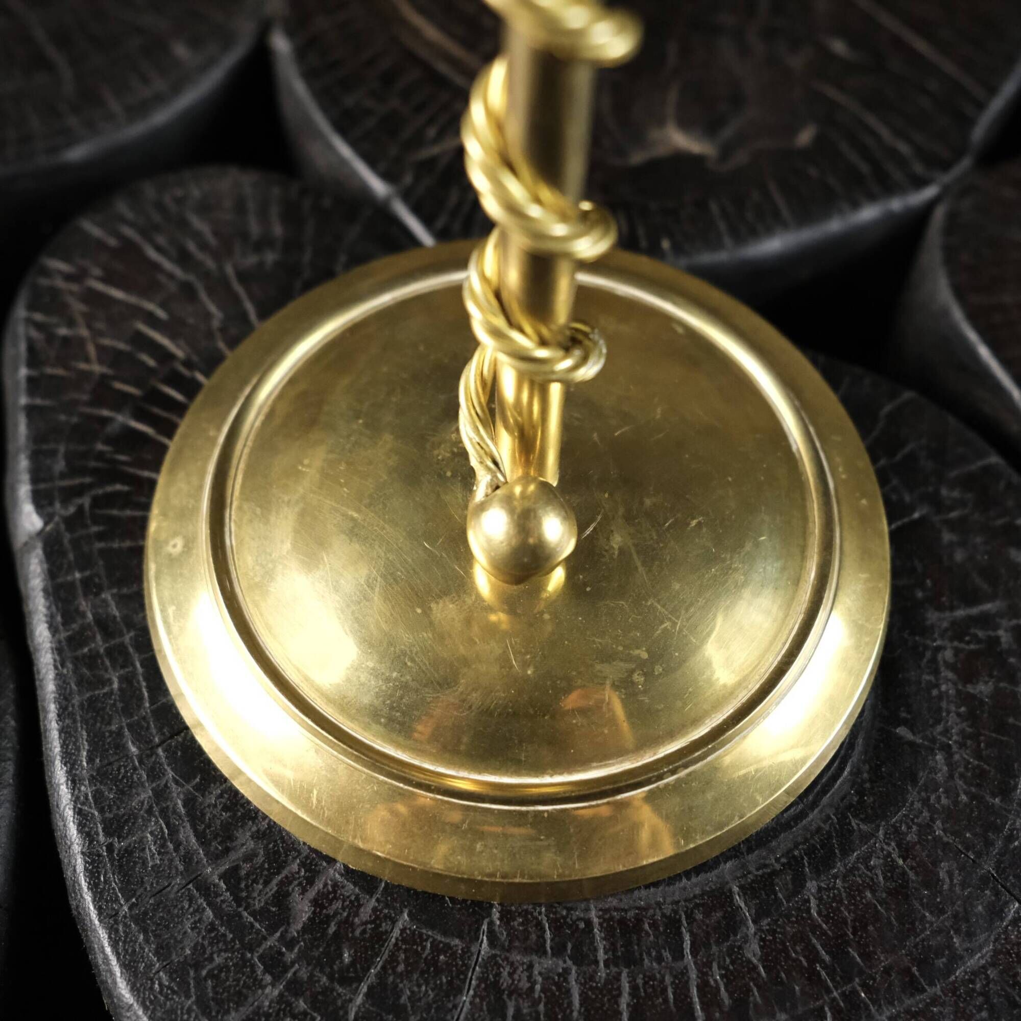Pair of Art Deco twisted brass candlesticks, France, 1930s
