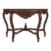 Antique console in carved walnut in the Louis-Philippe style.