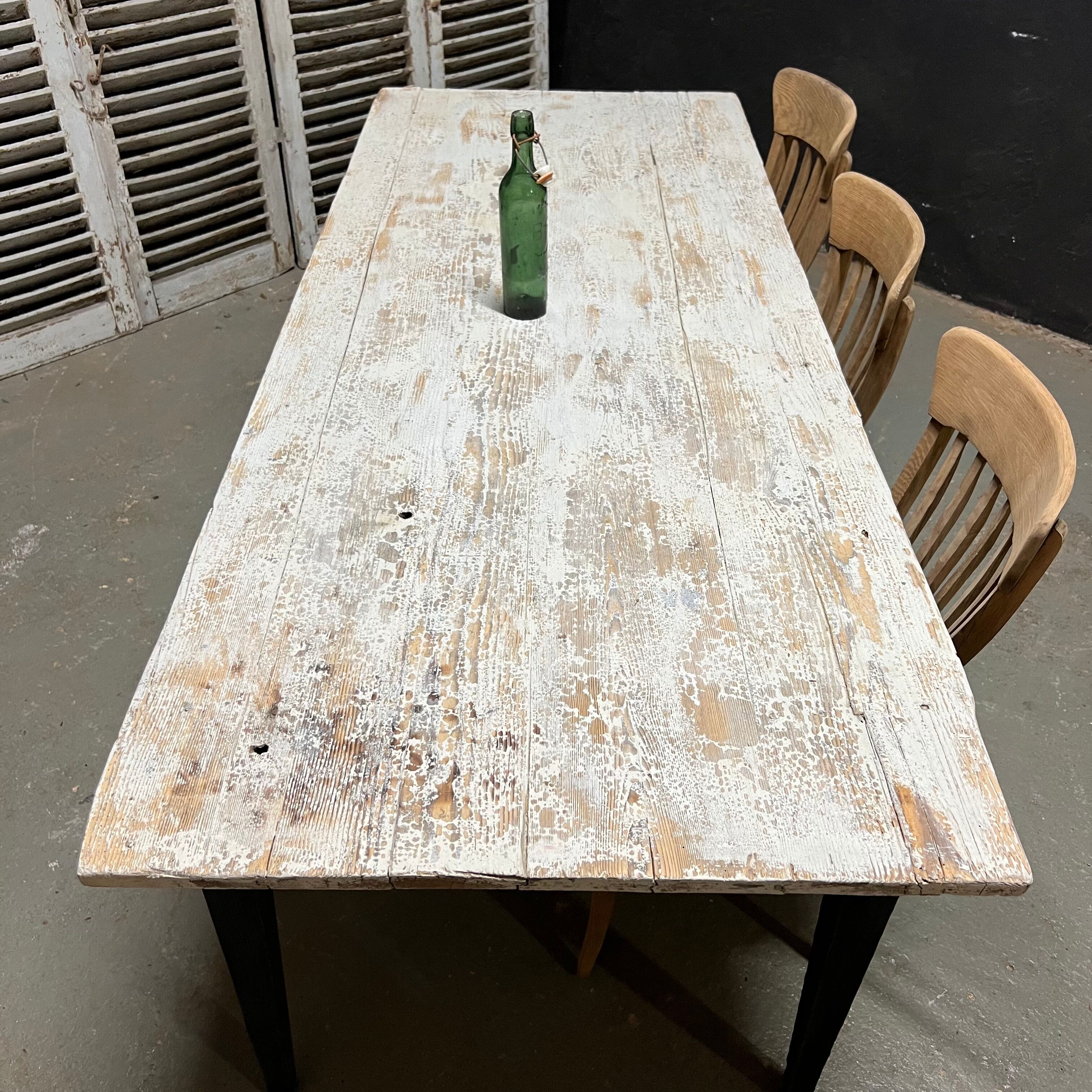 Black farmhouse table and white patinated top
