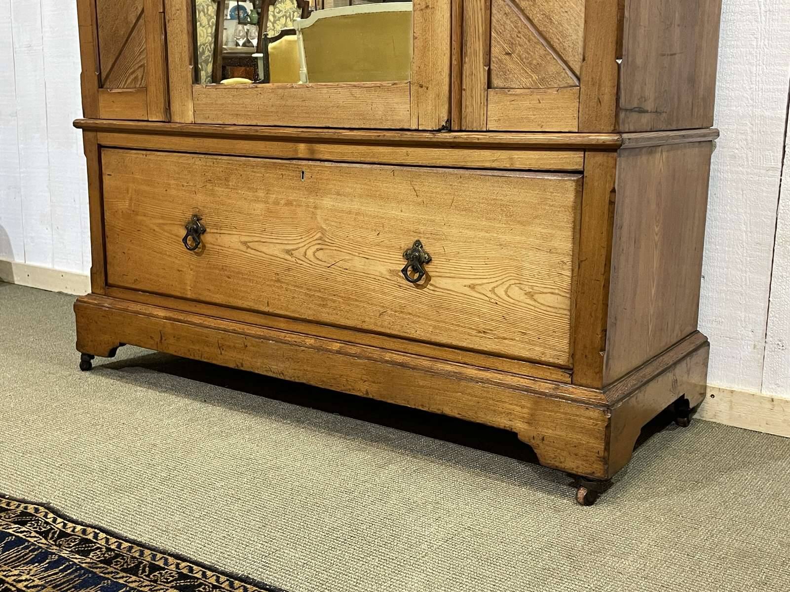 English oak wardrobe from the early 20th century.