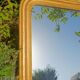 Antique Louis-Philippe mirror, gilded and patinated.