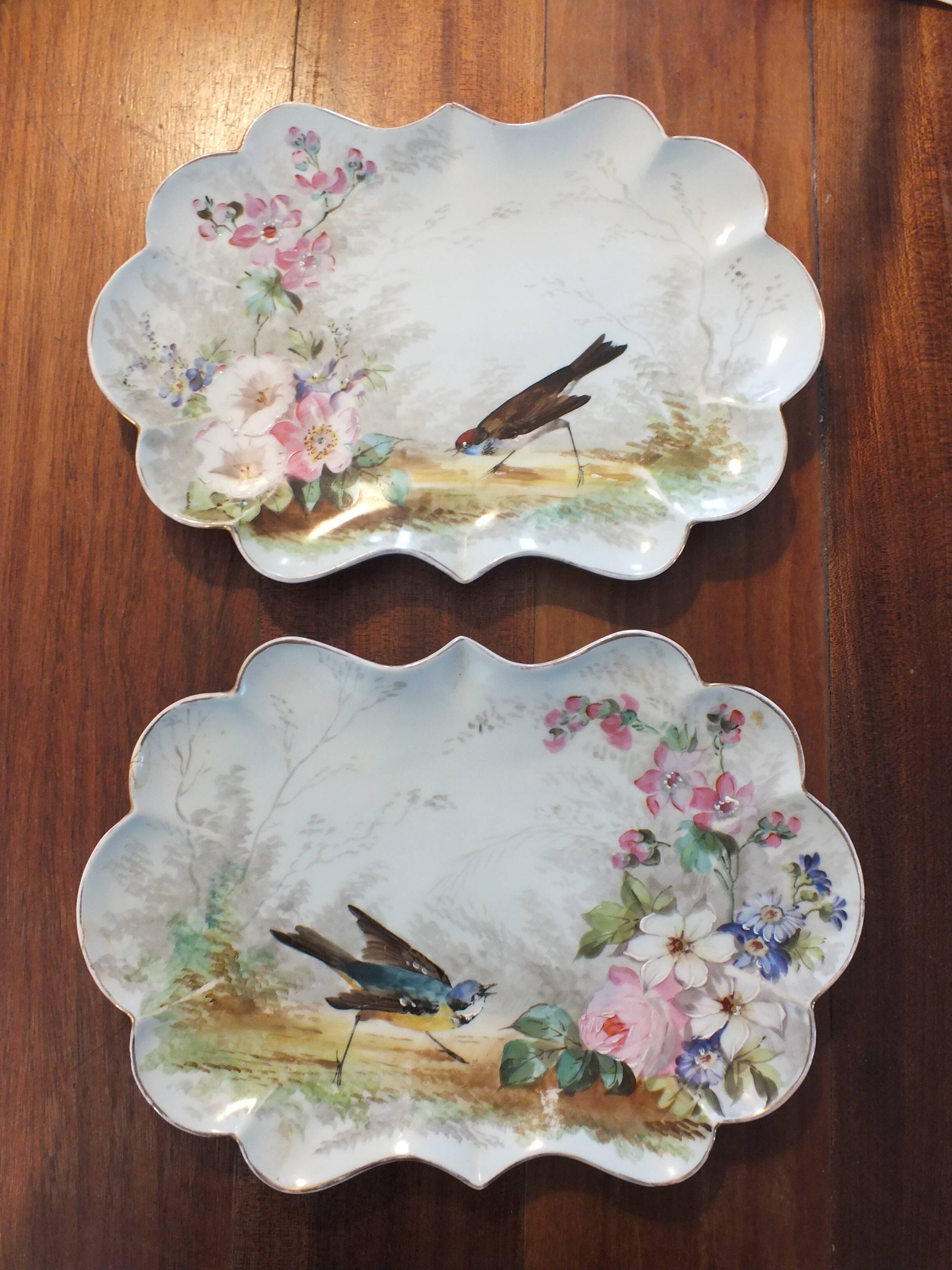 Pair of small porcelain dishes painted with birds and flowers 19th