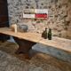 Old French industrial table with a cast iron base and a pine top.