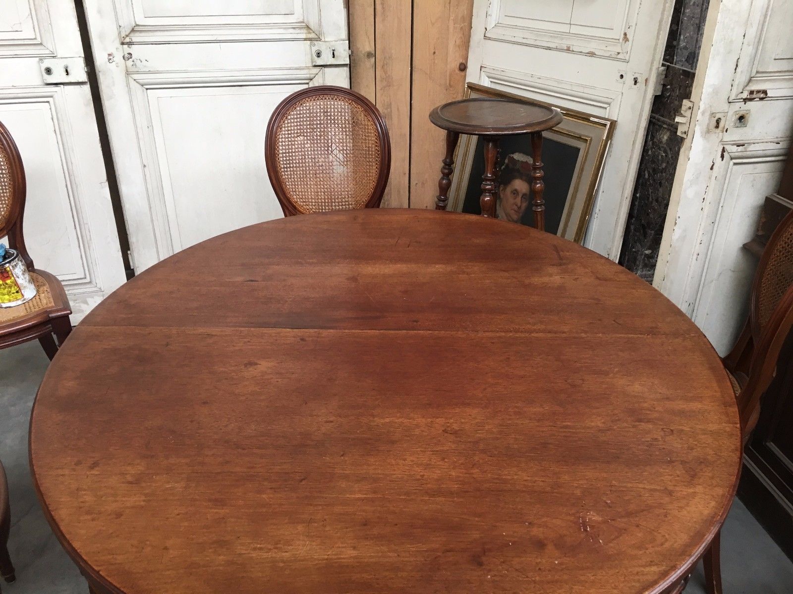 Table and six chairs in the Louis XVI style mahogany