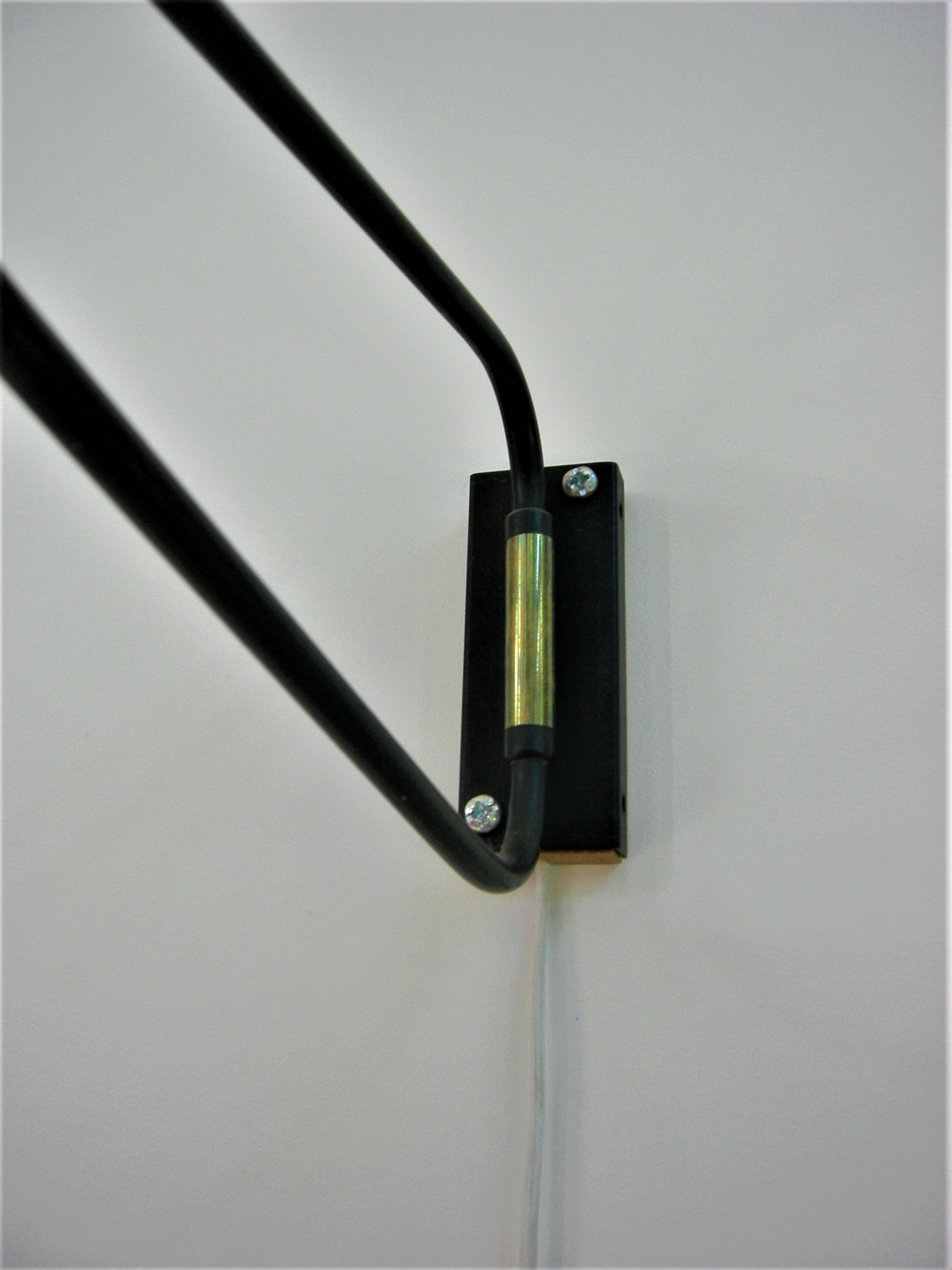 Roger Mathieu's diabolo sconce for Lunel with double lighting