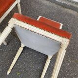 2 Louis XVI chairs in solid wood and orange velvet.
