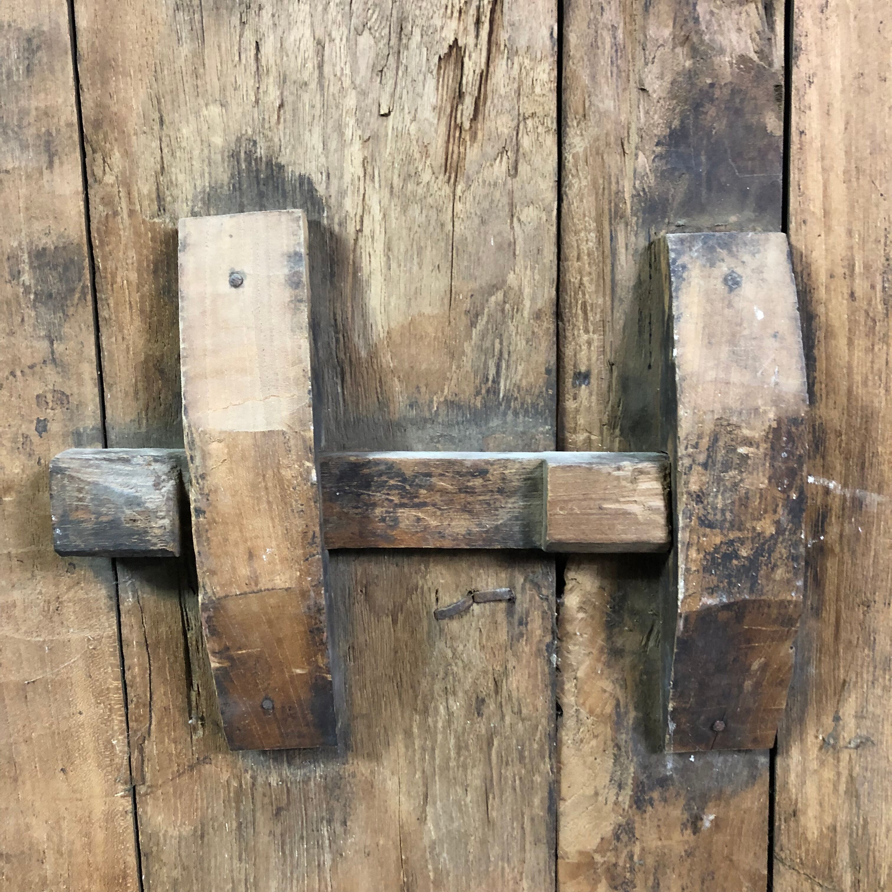 Old wooden door with its frame