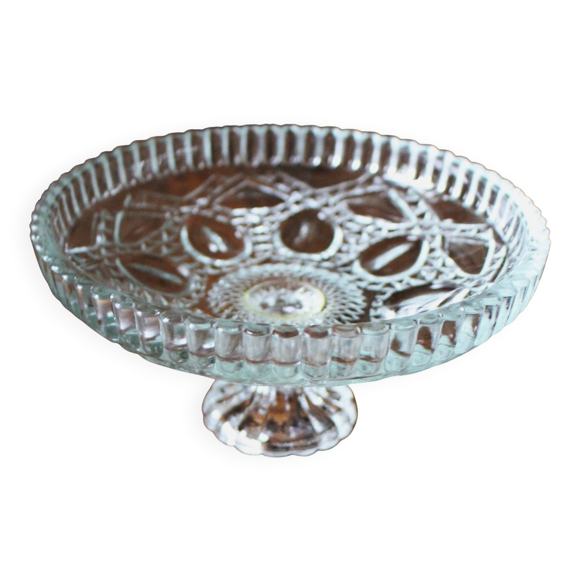 Cut glass goblet with a transparent stem.