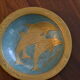 Empty pocket in brass dolphins design
