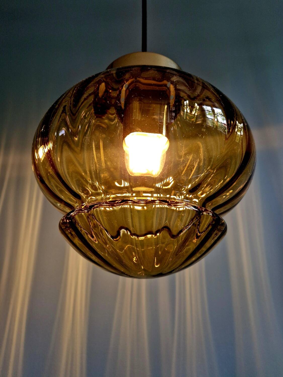 Set of 3 amber glass pendant lights, RAAK Amsterdam, 1970