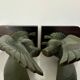 Pair of eagle bookends in green patina regula with rosewood base
