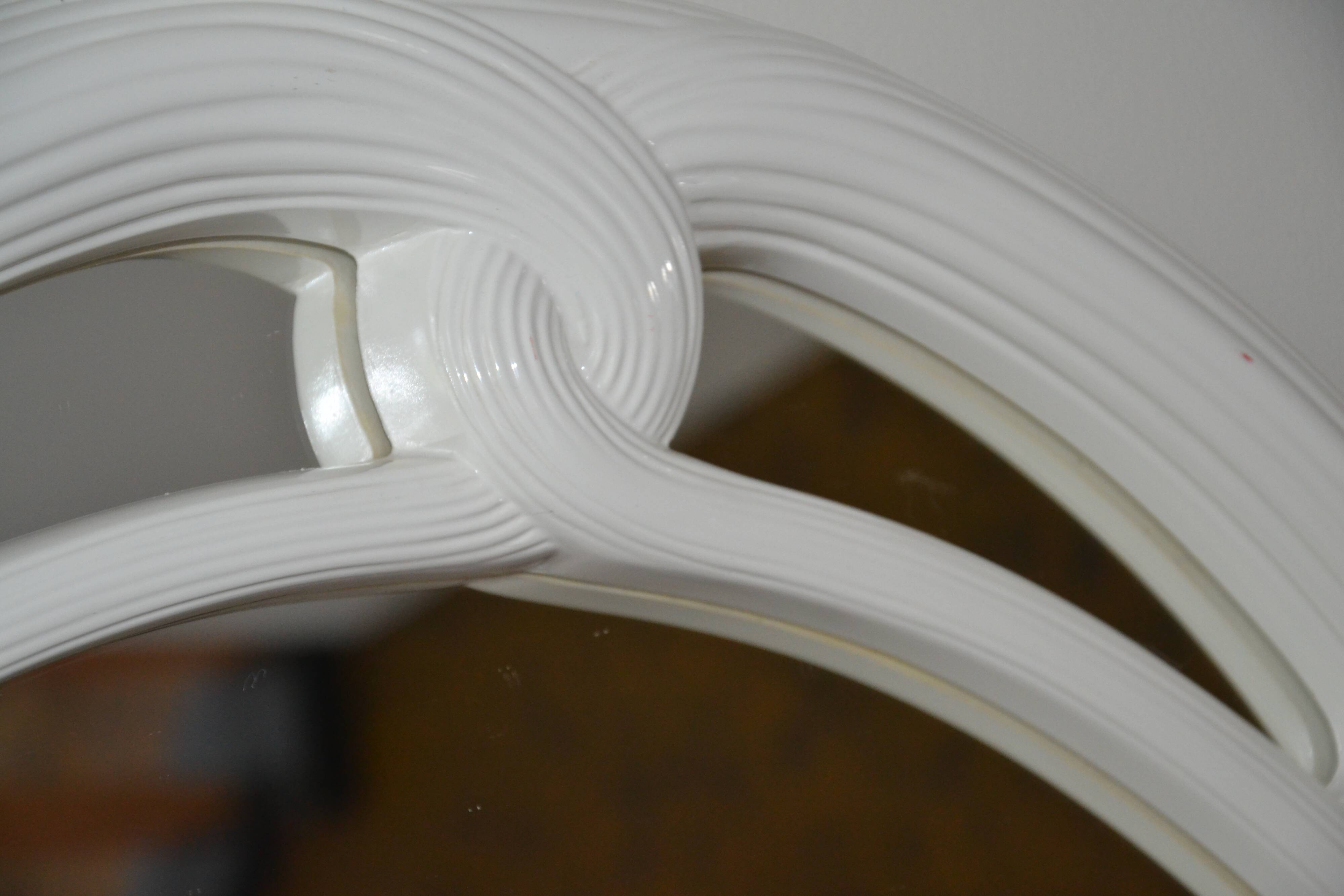White mirror in 90s Art Deco style