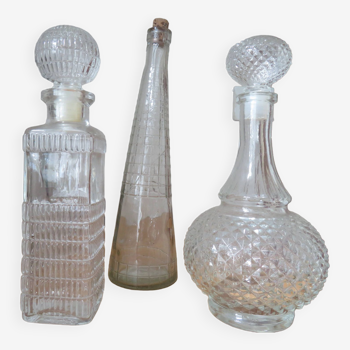 Set of carafes and white glass bottle