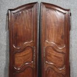 Pair of Louis XV period molded doors in solid walnut