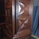 Standing man from the Louis XIII era in walnut with a diamond point.