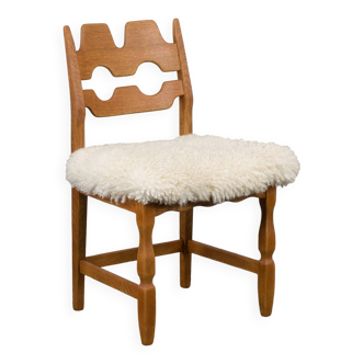 Oak Razor Blade chair in natural sheepskin by Henning Kjaernulf