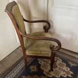 Armchair with a scroll, upholstered in green velvet