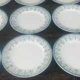 Lot de douze assiettes plates en terre de fer de la faïencerie Moulin des L