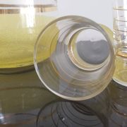 Old pitcher with its 8 yellow granite glasses with gold edging vintage 50's