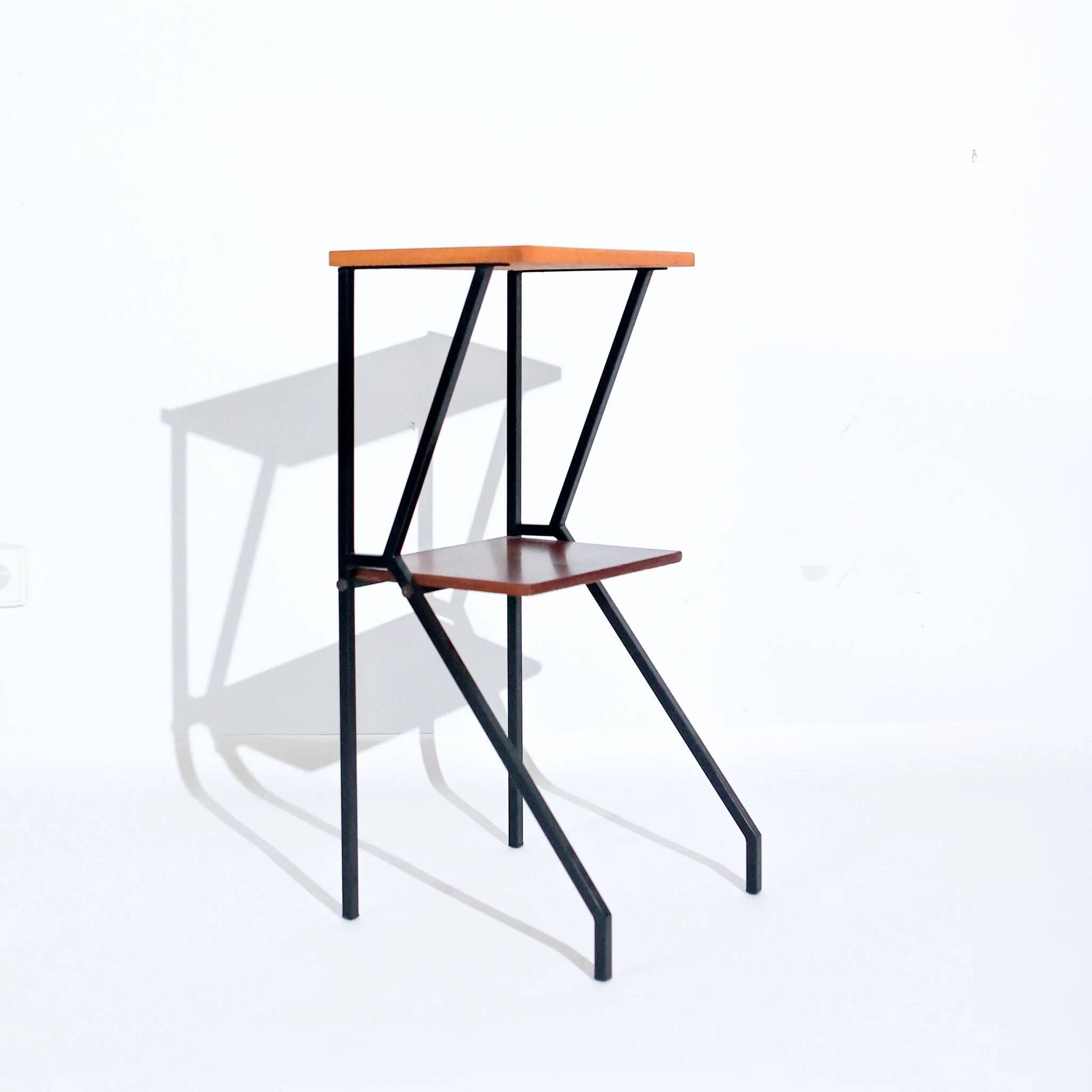 Mid-century modern Italian telephone side table with two levels, wood and black metal structure, 1960s.