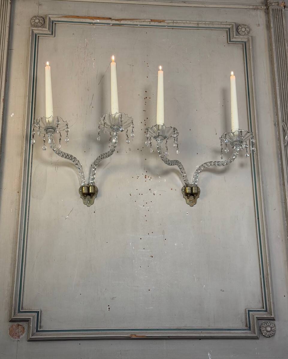 Pair of cut crystal wall sconces in the style of Maydwell and Windle, England, 18th century.