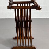 Vintage carved wooden folding armchair