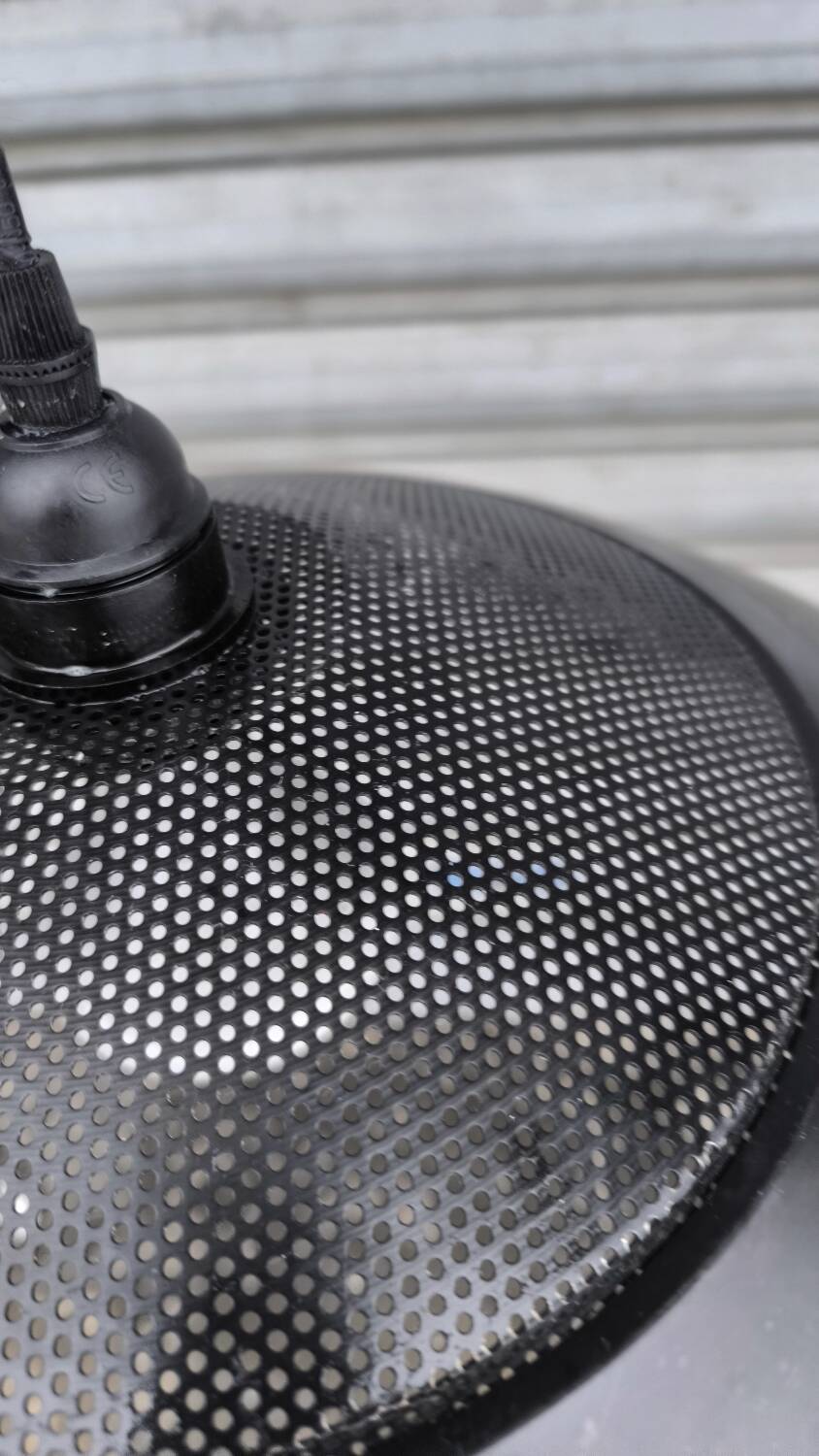 Perforated lacquered sheet metal suspension from the 90s