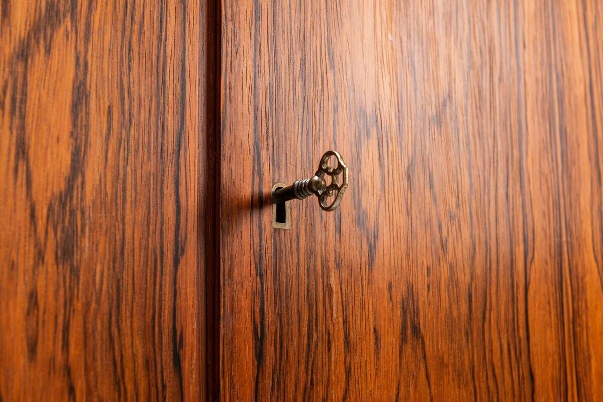 Illum Wikkelso bar cabinet in rosewood C. F. Christensen Denmark 1960