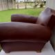Club armchair in brown skai back mustache