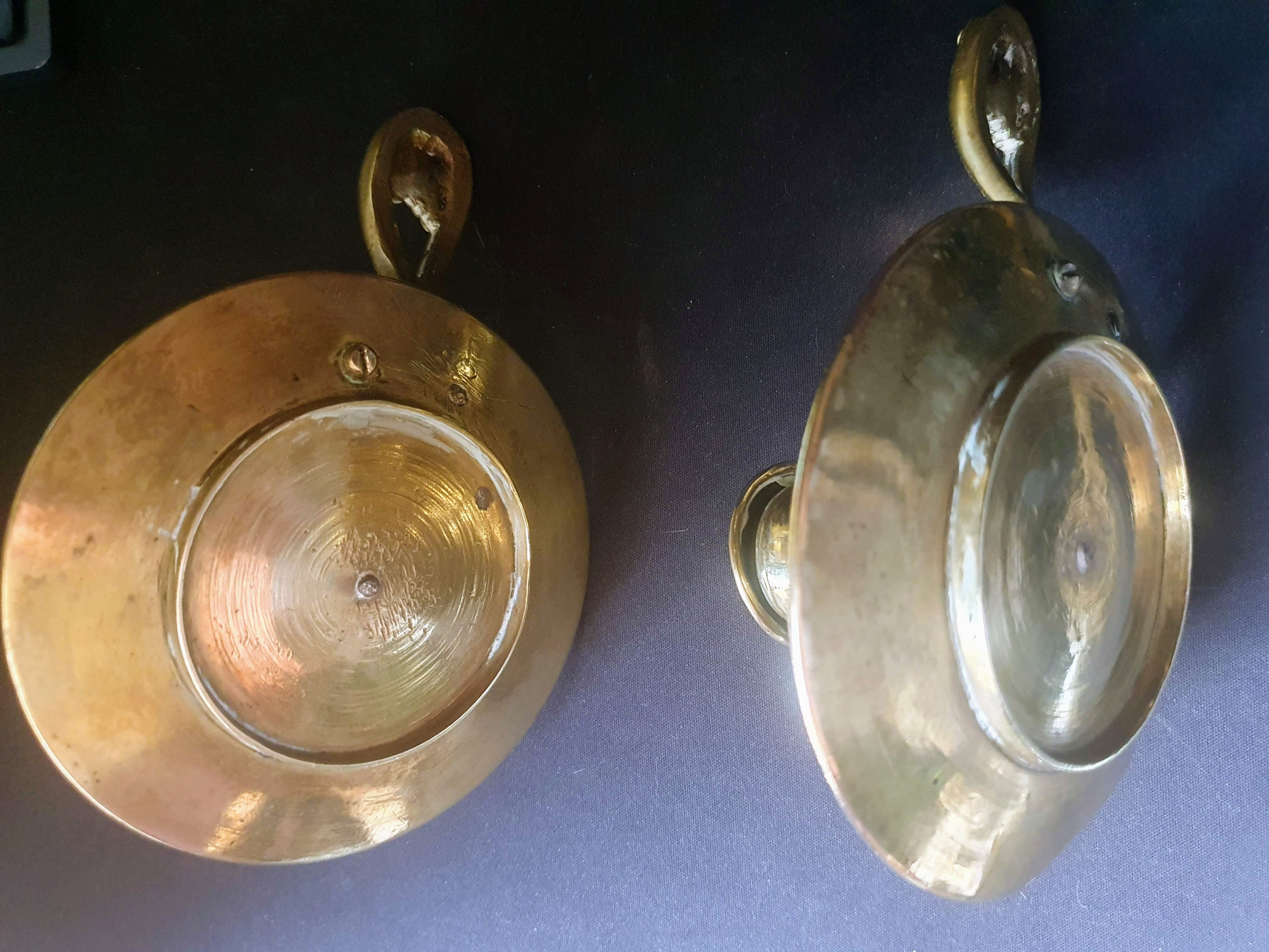 Pair of hand candle holders