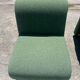 Green armchairs designed by Étienne Fermigier