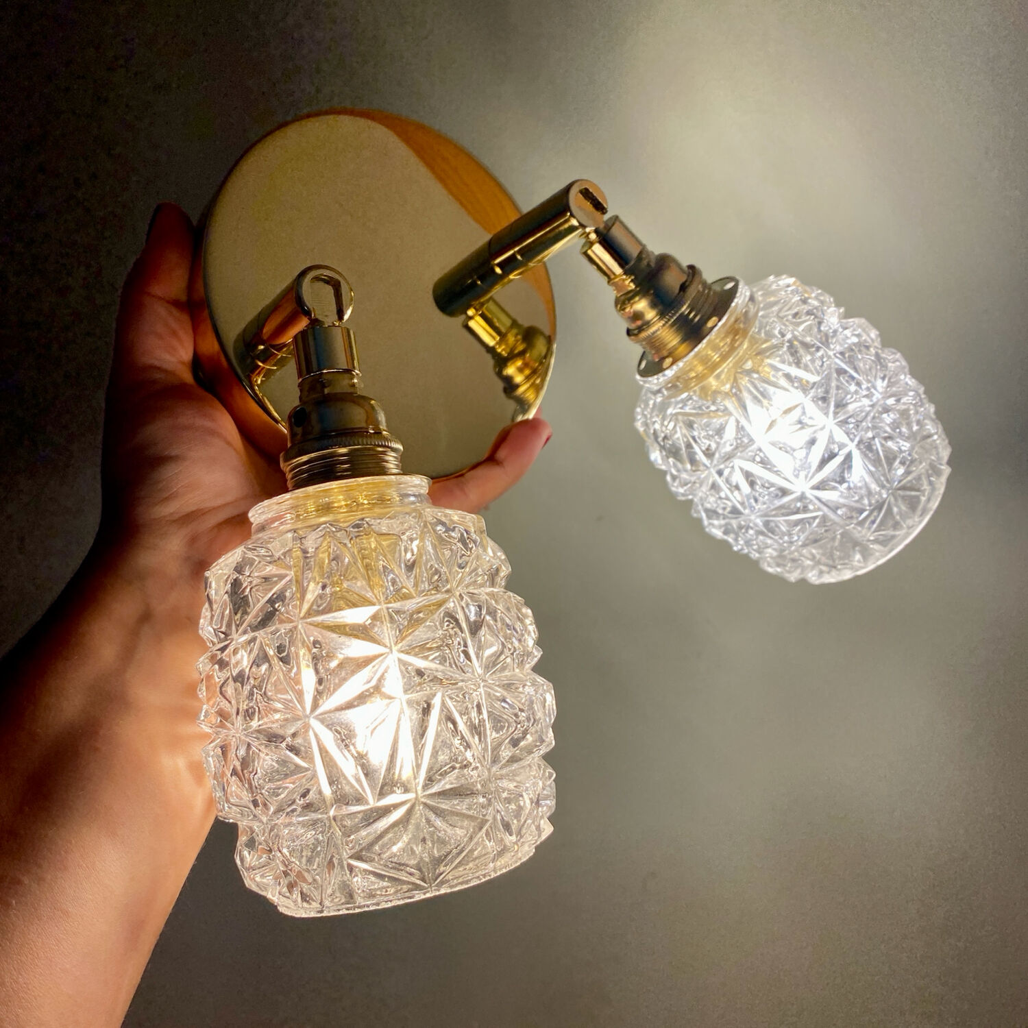 Double vintage tulip wall light in moulded glass.