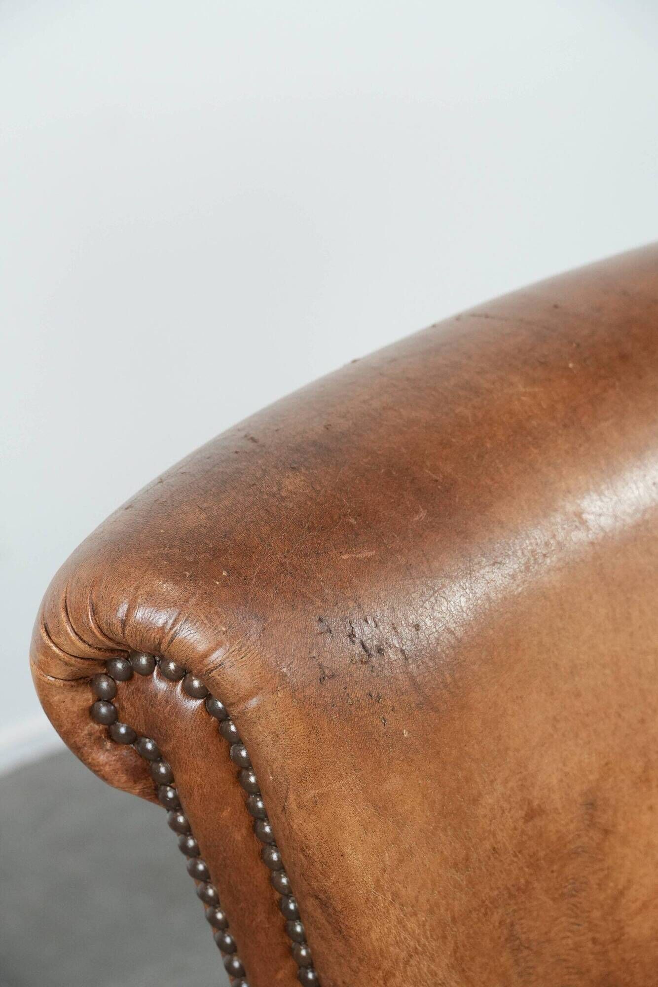 Set of two vintage sheepskin armchairs with beautiful and warm colours
