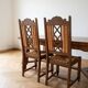Dining table set with 6 chairs in cherry wood.