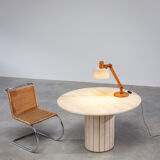 Circular modernist dining table in travertine 1970